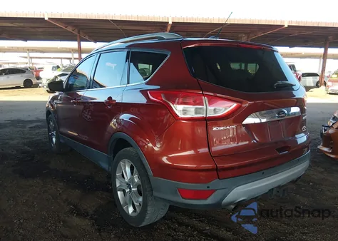2014 Ford Escape Titanium z USA, uszkodzony, nr VIN 1FMCU0J9XEUA04504